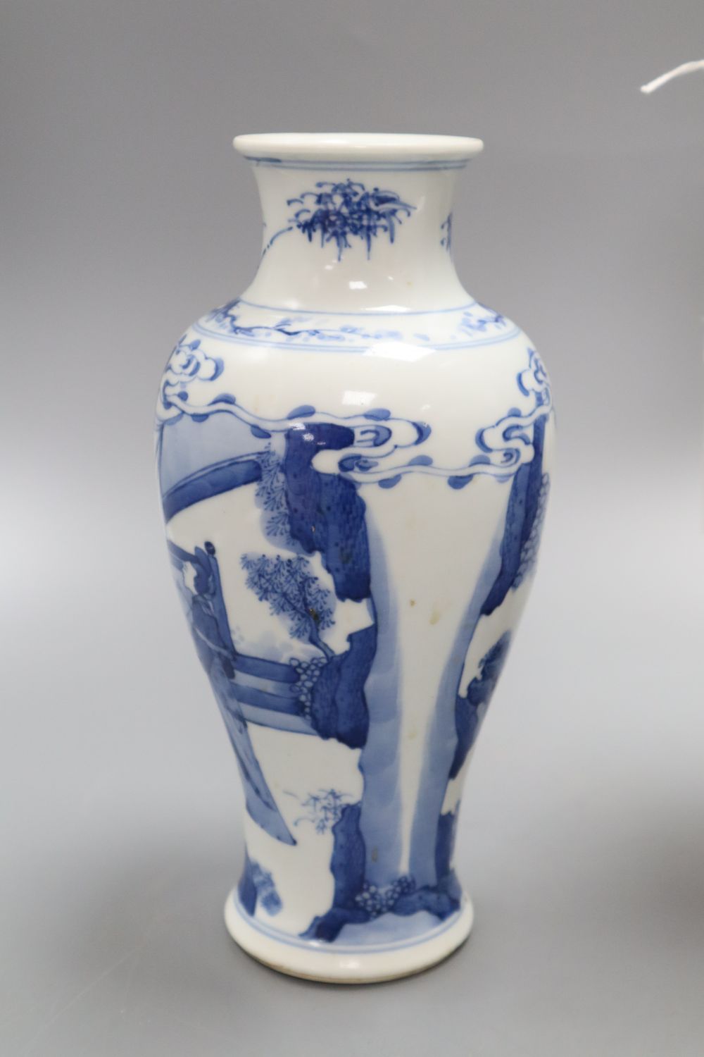 A Chinese famille rose crackleglaze vase and cover, together with a Chinese blue and white figural vase bearing Kangxi mark,